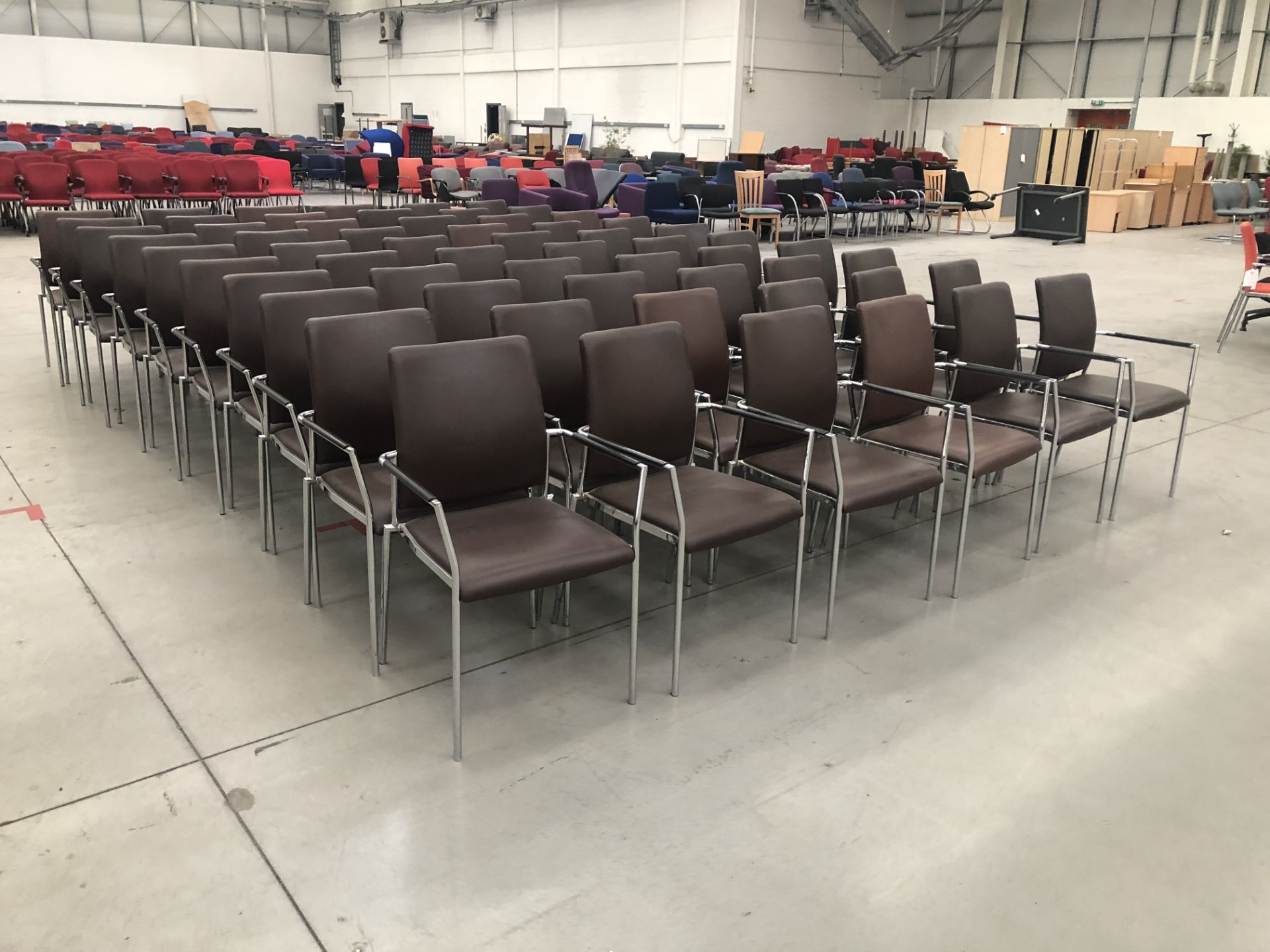60 x Faux leather chairs with metal legs and arms