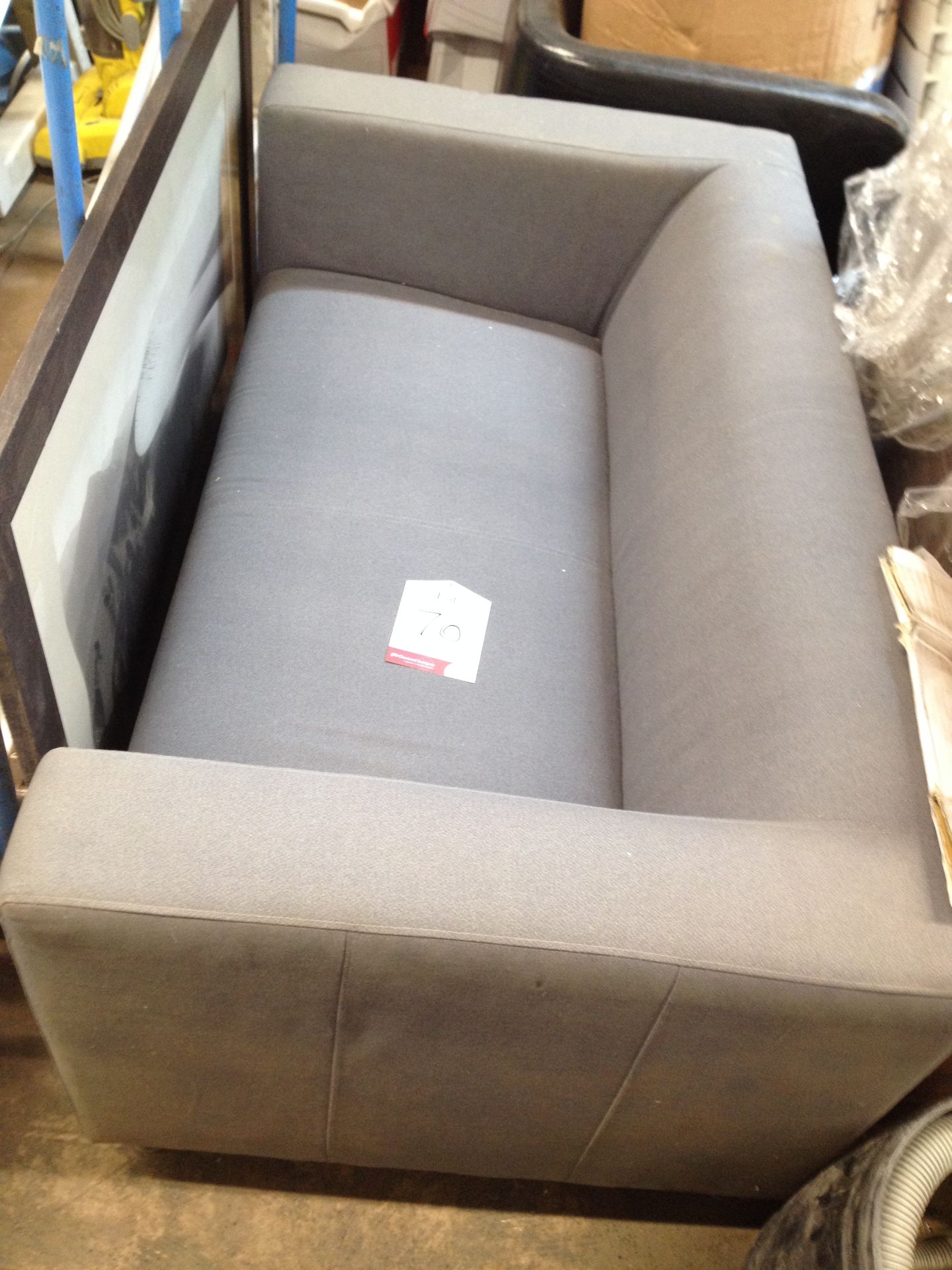 2 seater light grey Couch with 2 Footstalls