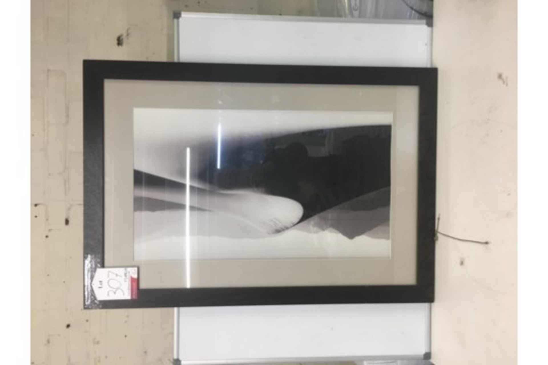 Dark brown framed printed picture