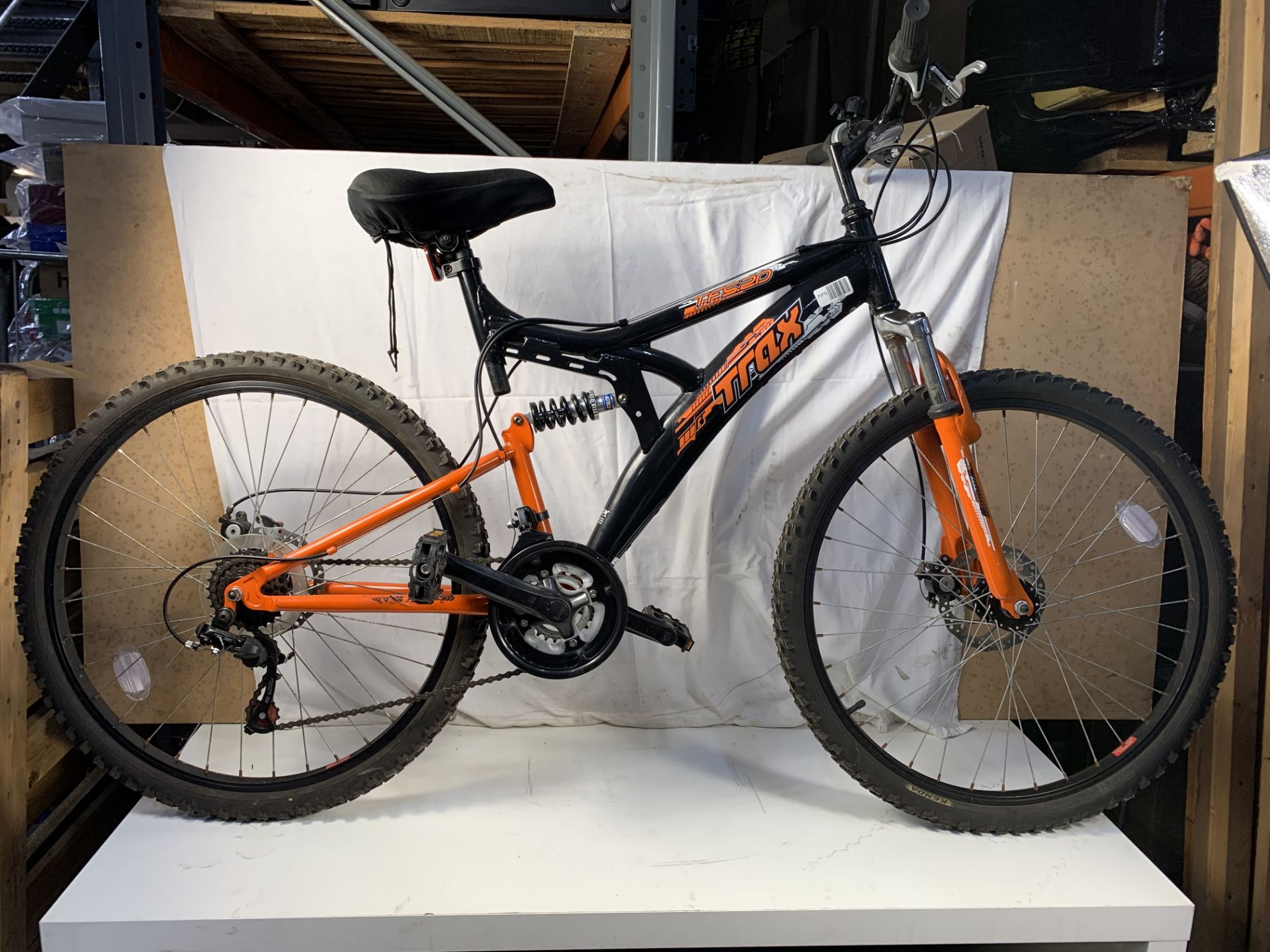 Trax TFS.20 black and orange 18 speed mountain bike