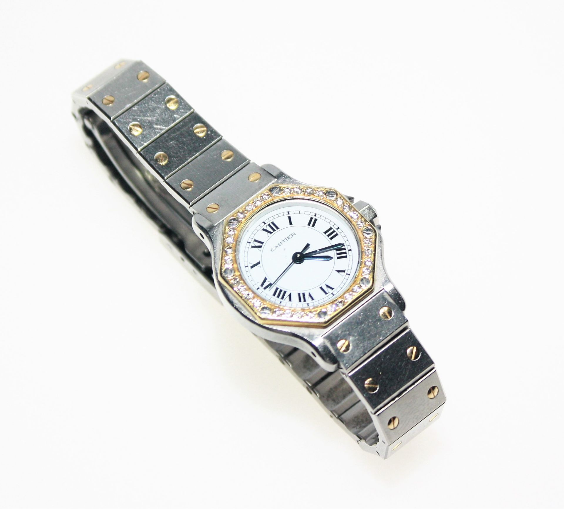 Damen-Armbanduhr Stahl/Gold Cartier, rundes, weißes Zifferblatt mit römischen Ziffern, umgeben von
