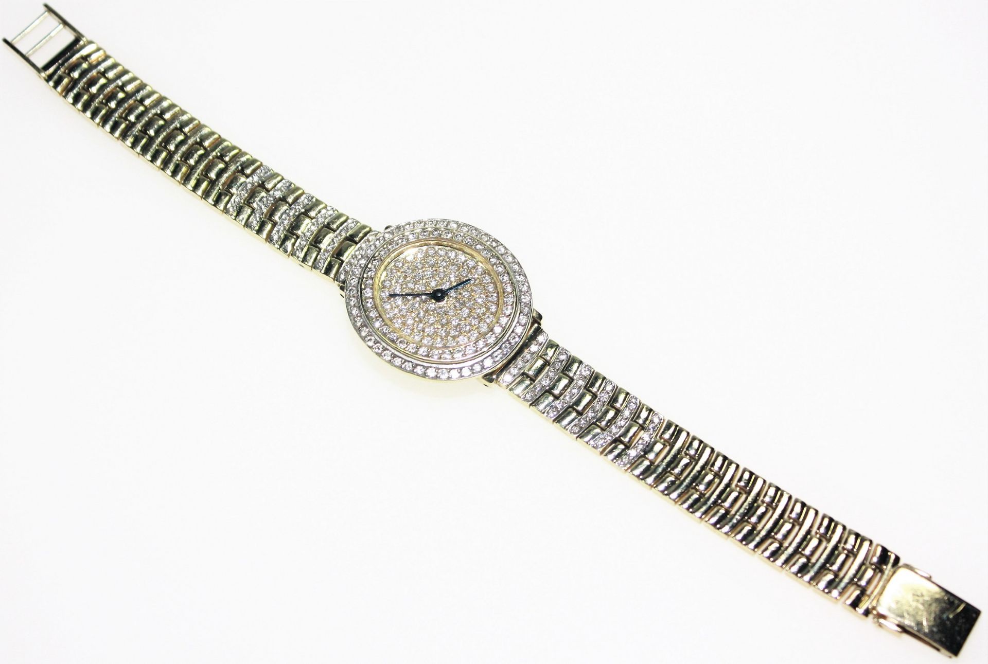 Moderne Damen-Armbanduhr in Gelb- und Weißgold ca. 585/f, Zifferblatt, Lünette und 10 Streifen im