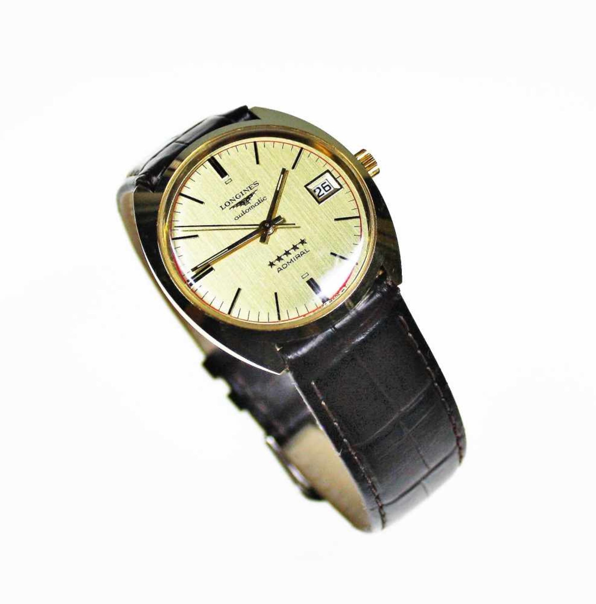 Goldene Herren-Armbanduhr ca. 750/f, rundes, goldfarbiges Zifferblatt bezeichnet Longines,