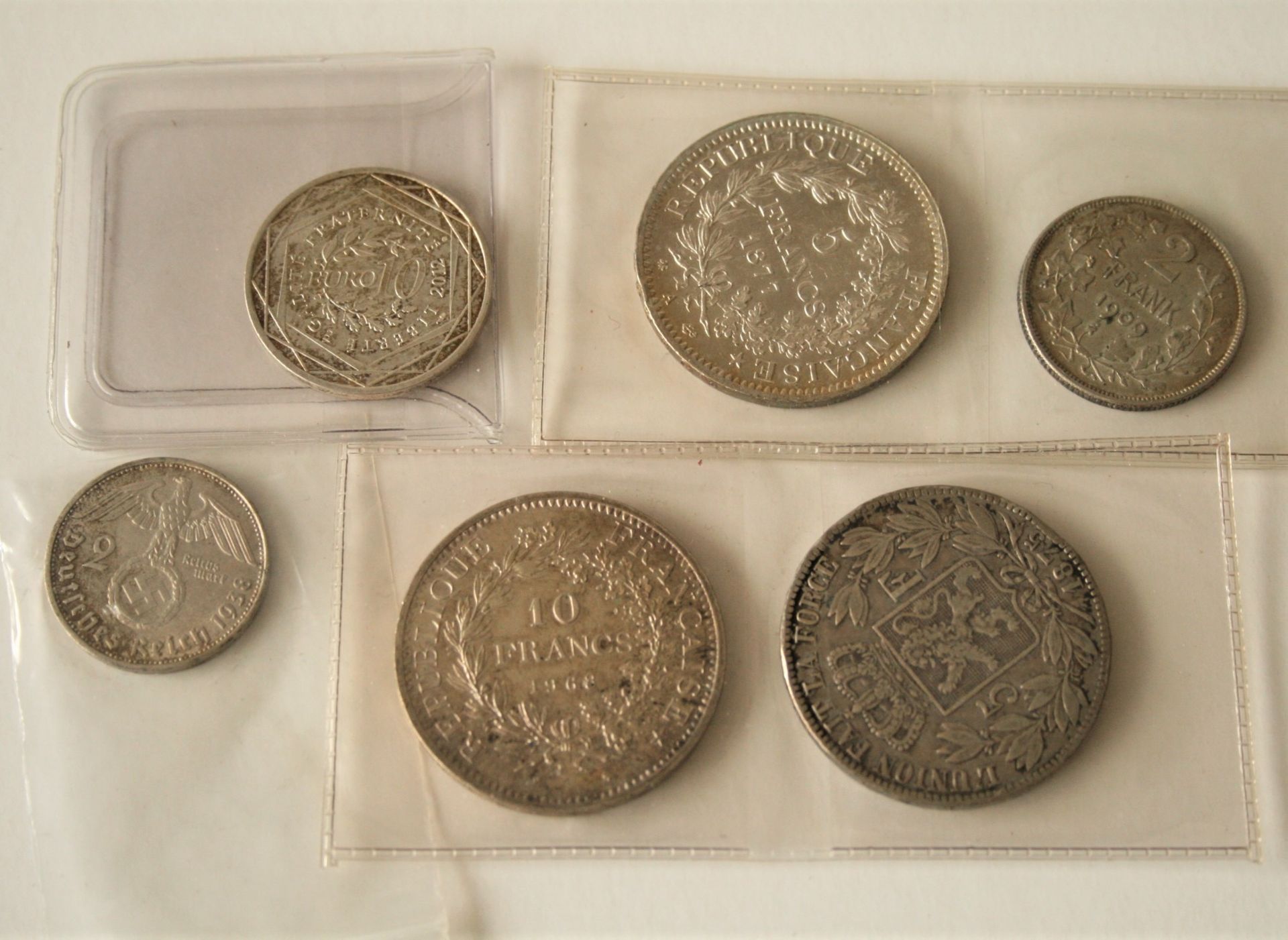 1. Leopold II Roi des Belges 1875, 2. 10 Francs République Française 1968, 3. 5 [...]