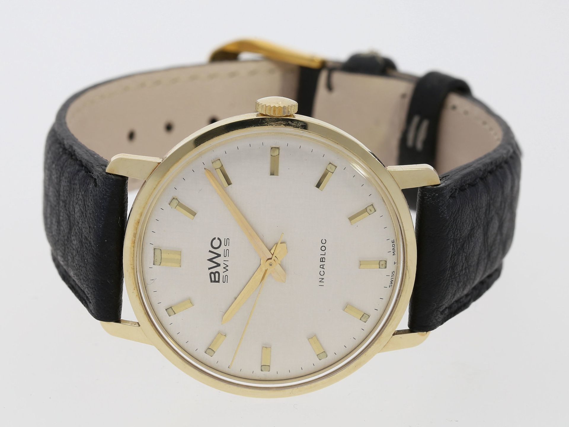 Armbanduhr: elegante, flache 14K Gold Herrenarmbanduhr BWC Swiss, 70er/80er JahreCa. Ø34,5mm, 31,5g,