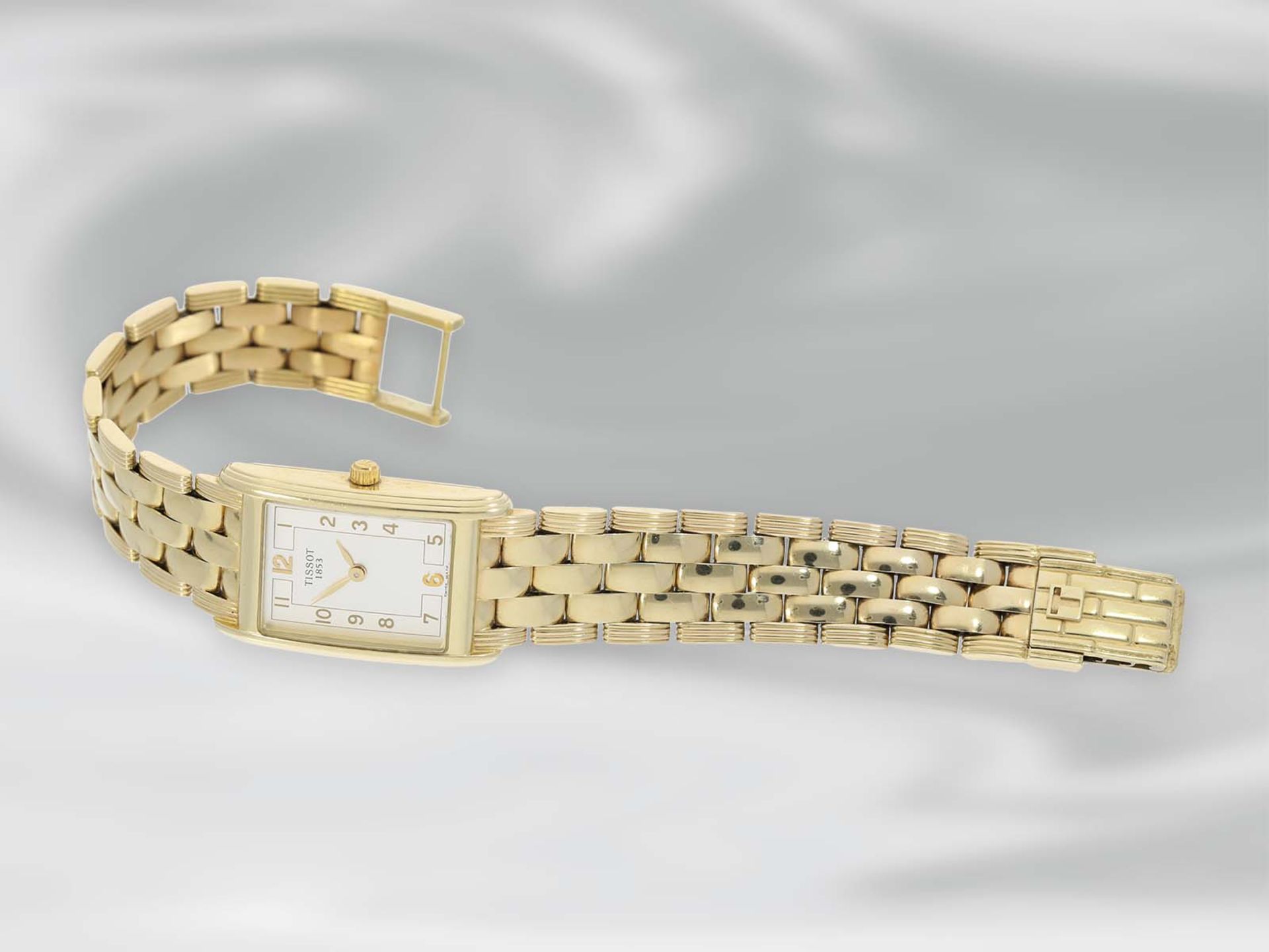 Armbanduhr: elegante Damenuhr der Marke Tissot, 14K Gold, Ref. T73231432, OriginalpapiereCa. 17cm