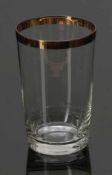 Trinkglas mit GoldrandUm 1900. Farbloses Glas, breiter Goldrand. Geätzter Füllstrich: 0,3 L. H. 11,5
