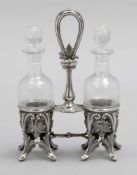 Biedermeier-MenageDeutschland, um 1860. 800er Silber. Glas. Punzen: Herst.-Mark, 800. H. 23,5 cm.