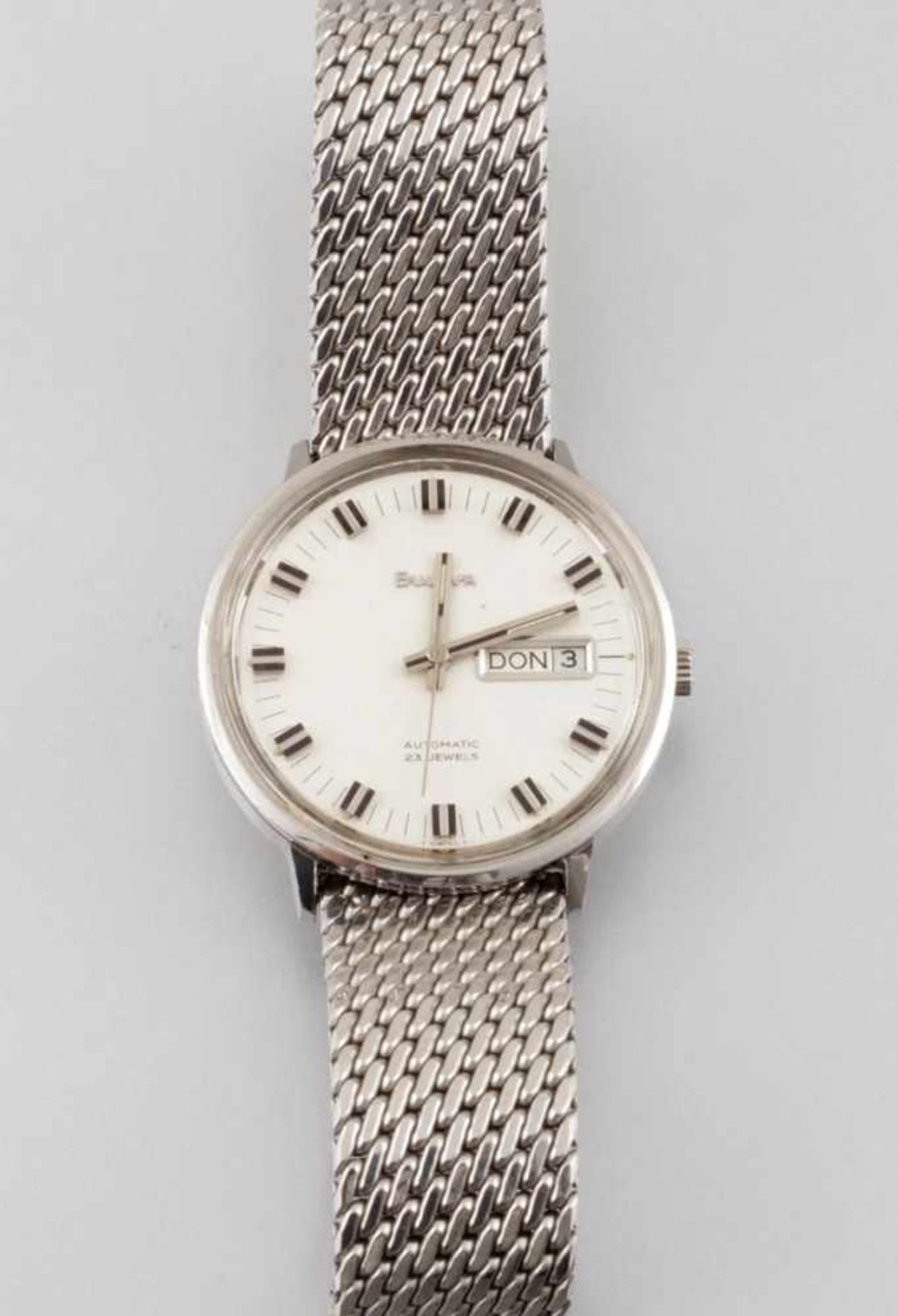 Bulova-HerrenarmbanduhrFa. Bulova Watch Co. Inc. Vintage mit Datum. Edelstahl. Auf dem Zifferblatt - Image 2 of 2