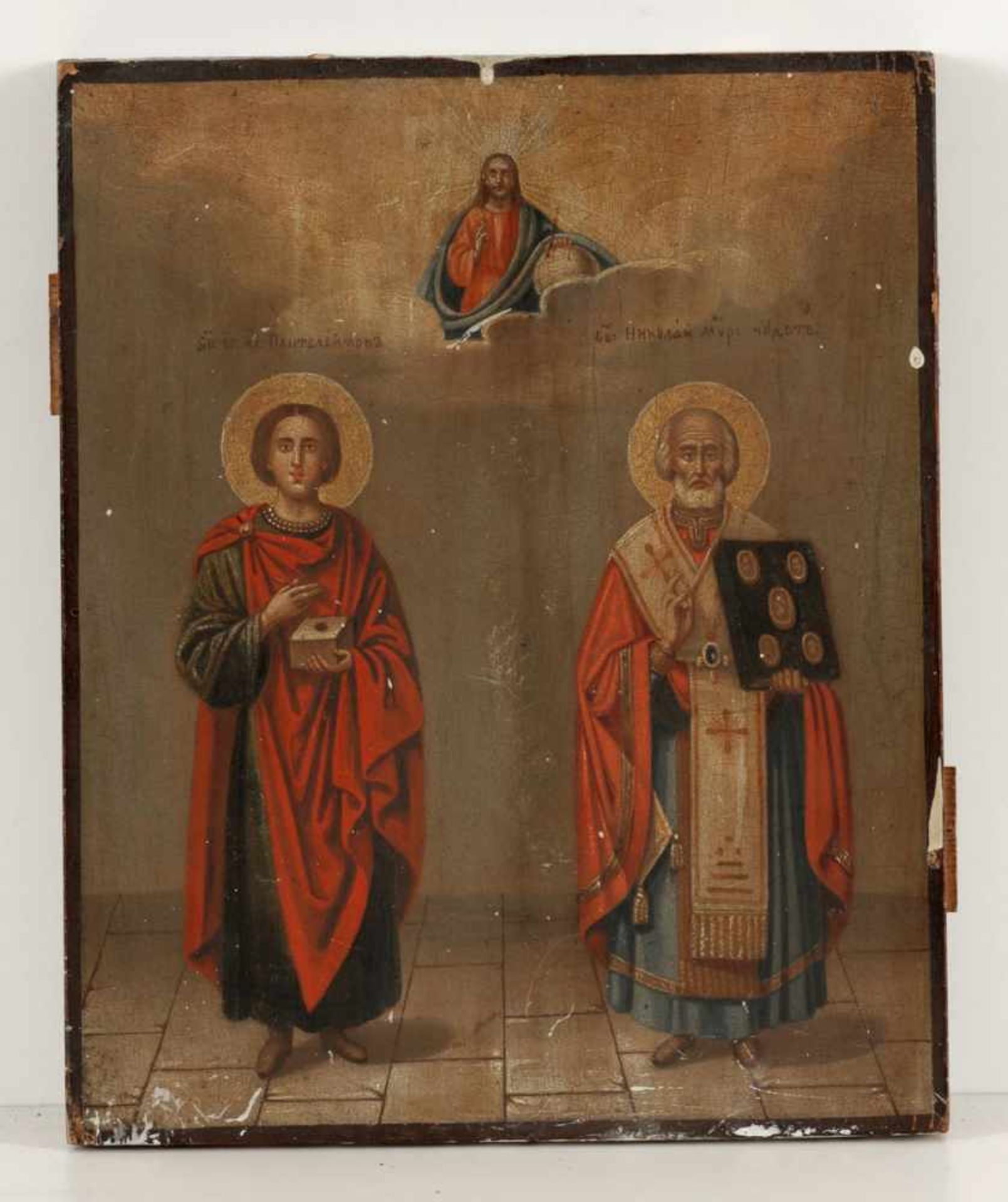 IkoneRussland, 19. Jahrhundert. - "Hl. Panteleimon und Hl. Nikolaus" - Tempera/Holz. 24,5 x 20 cm.
