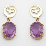 Paar Amethyst-Ohrstecker750/- Gelbgold, gestempelt. Gewicht: 6,2g. 2 Amethyste im Oval-Schliff