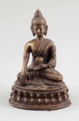 BuddhaTibet, 19. Jahrhundert. Bronze. H. 14 cm. Sitzend auf Lotussockel.