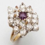 Damenring mit Brillanten und einem RhodolithA Lady's diamond and rhodolite ring 750er GG und WG,