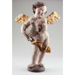 Bildschnitzer des 18. Jahrhunderts- Putto mit Lämmchen in den Armen wiegend - Holz. Polychrom und