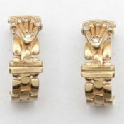 Paar Kreolen mit Krone585/-Gelbgold, gestempelt. Gewicht: 7,8g. Div. Diamanten. L. 1,8 cm. Stecker.