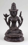 Bodhisattva mit 3 GesichternWohl Tibet, um 1900. Bronze. H. 16 cm. Sitzend auf Lotussockel.