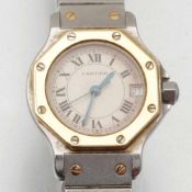 Cartier-DamenarmbanduhrFa. Cartier, Schweiz. Modell: Santos. Edelstahl/750er GG, gestemp. Gewicht: