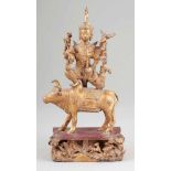 Bodhisattva auf StierThailand, Bangkok Periode. Bronze. Vergoldet. H. 37 cm. Reich geschmückte