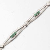 Armband mit Smaragden585/- Weißgold, gestempelt. Gewicht: 14,7g. 12 Smaragde im Rundschliff zus. ca.