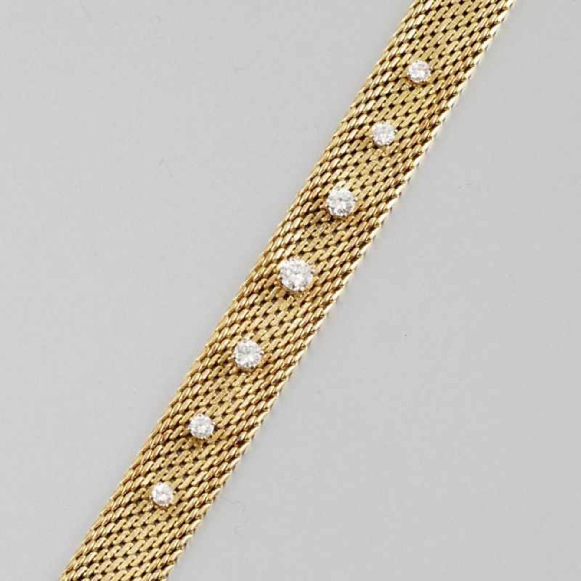 Armband mit Brillanten585er GG und WG, gestemp. 7 Brillanten zus. ca. 1 ct (tw-w/vsi). L. 18,2 cm.