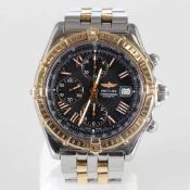 Breitling - HerrenarmbanduhrFa. Breitling, Schweiz: Modell: Chronogragh Automatic. Edelstahl/Gold.