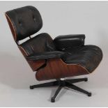 Lounge ChairVitra/Schweiz. Entwurf: Ray und Charles Eames. Palisander. Leder. 40/80 x 84 x 75 cm.