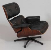 Lounge ChairVitra/Schweiz. Entwurf: Ray und Charles Eames. Palisander. Leder. 40/80 x 84 x 75 cm.