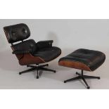 Lounge Chair mit OttomaneVitra/Schweiz. Entwurf: Ray und Charles Eames. Palisander. Leder. 40/80 x