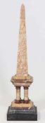 ObeliskUm 1900. Marmor. H. 61 cm. Best. Auf getrepptem, profilierten Sockel. Konischer Aufsatz auf