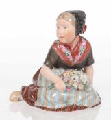Trachtenfigur - Mädchen von Färöer mit plastischem BlumenstraußKönigliche Porzellanmanufaktur,