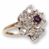 Damenring mit Brillanten und einem RhodolithA Lady's diamond and rhodolite ring 750er GG und WG,