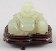 BuddhaJapan. - Ho-Tai - Jade. H. 7 cm. Mit Holzsockel.- - -22.00 % buyer's premium on the hammer