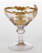 Fußschale in Schiffchenform als KonfektschaleSchlesien, um 1750. Farbloses Glas. Gold bemalt.