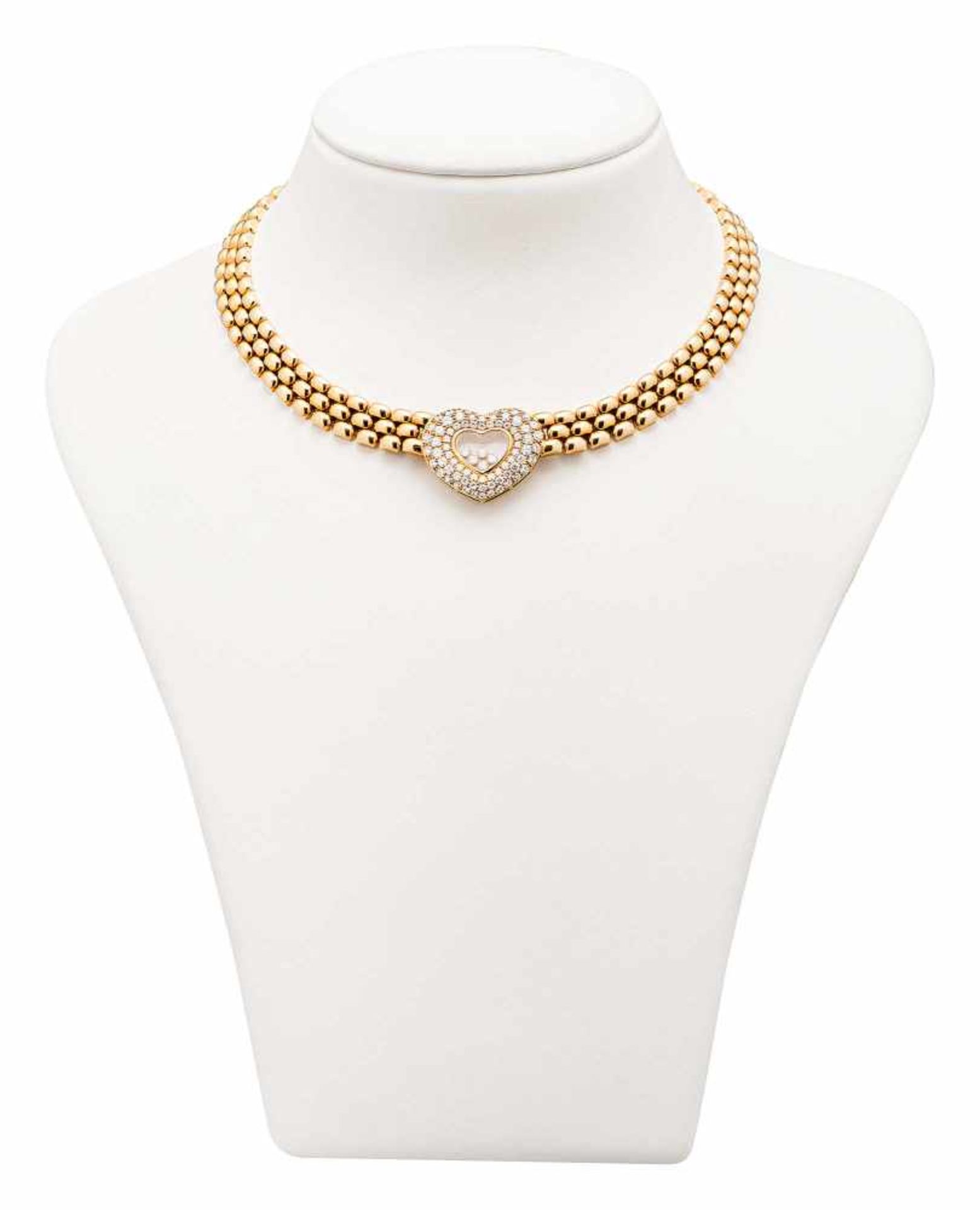 Chopard Collier «Happy Diamonds»Genf 2000er Jahre. GG 18 Kt. Umlaufend dreireihige Gliederkette,