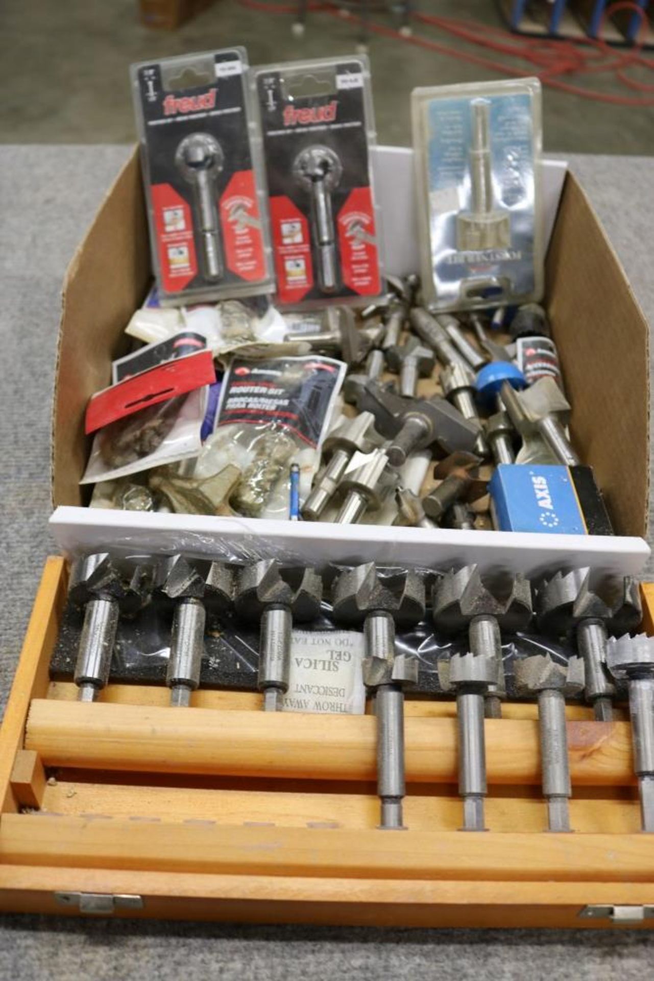 Box of New and Used Router Bits and Forstner Bits and Router Bearings