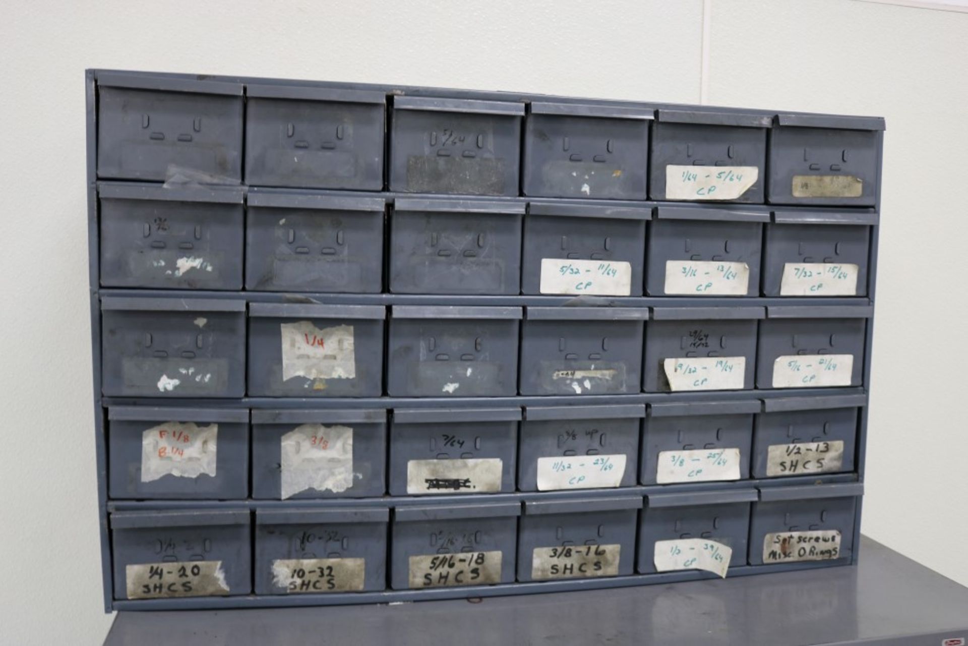 24 Bin Organizer Full of Various Sized Die Springs and Return Pins for Injection Molds