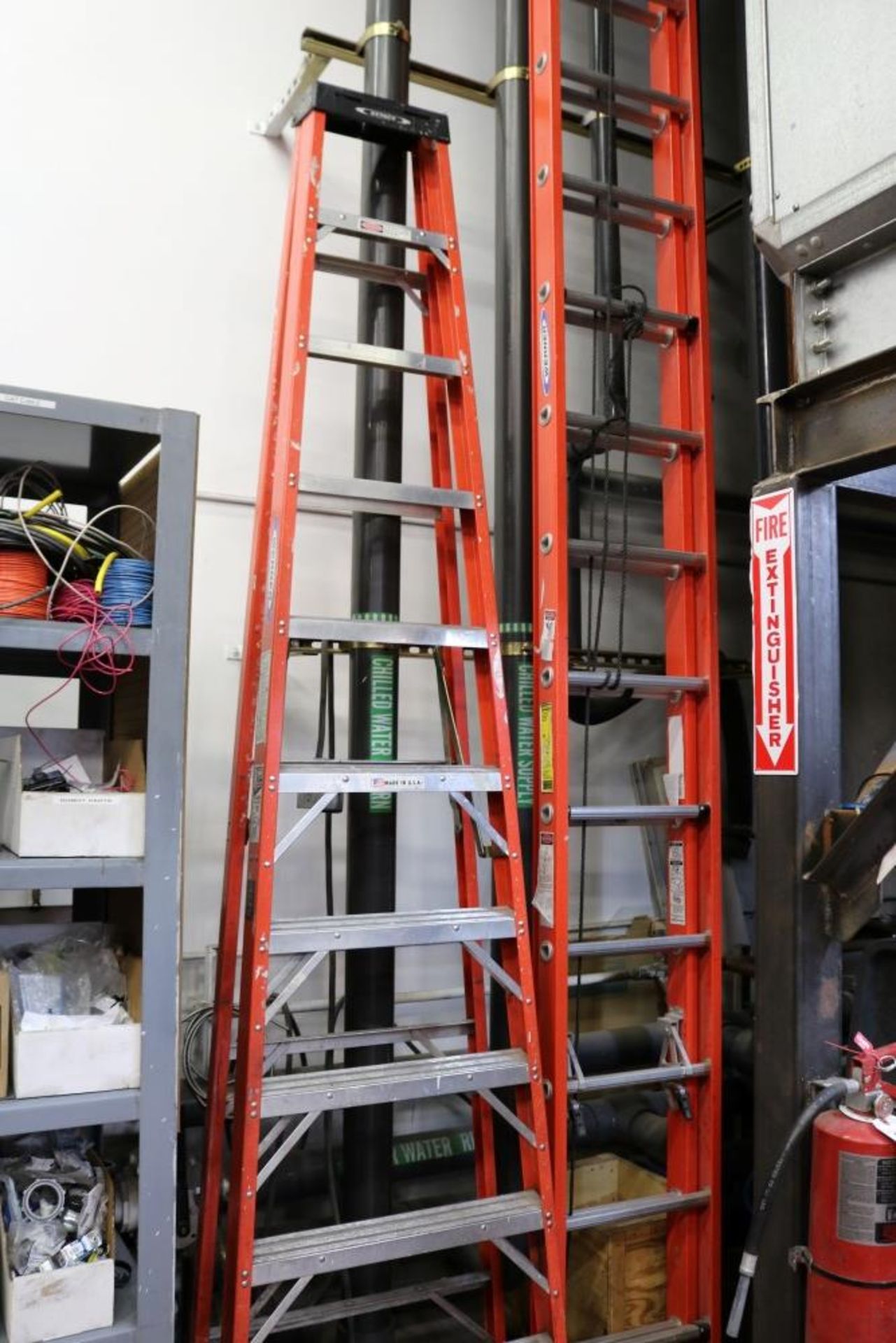 (2) Ladders (1) Werner 10" Step Lasdder 300 lb. capacity / (1) Werner 32' Extension Ladder 300lb.