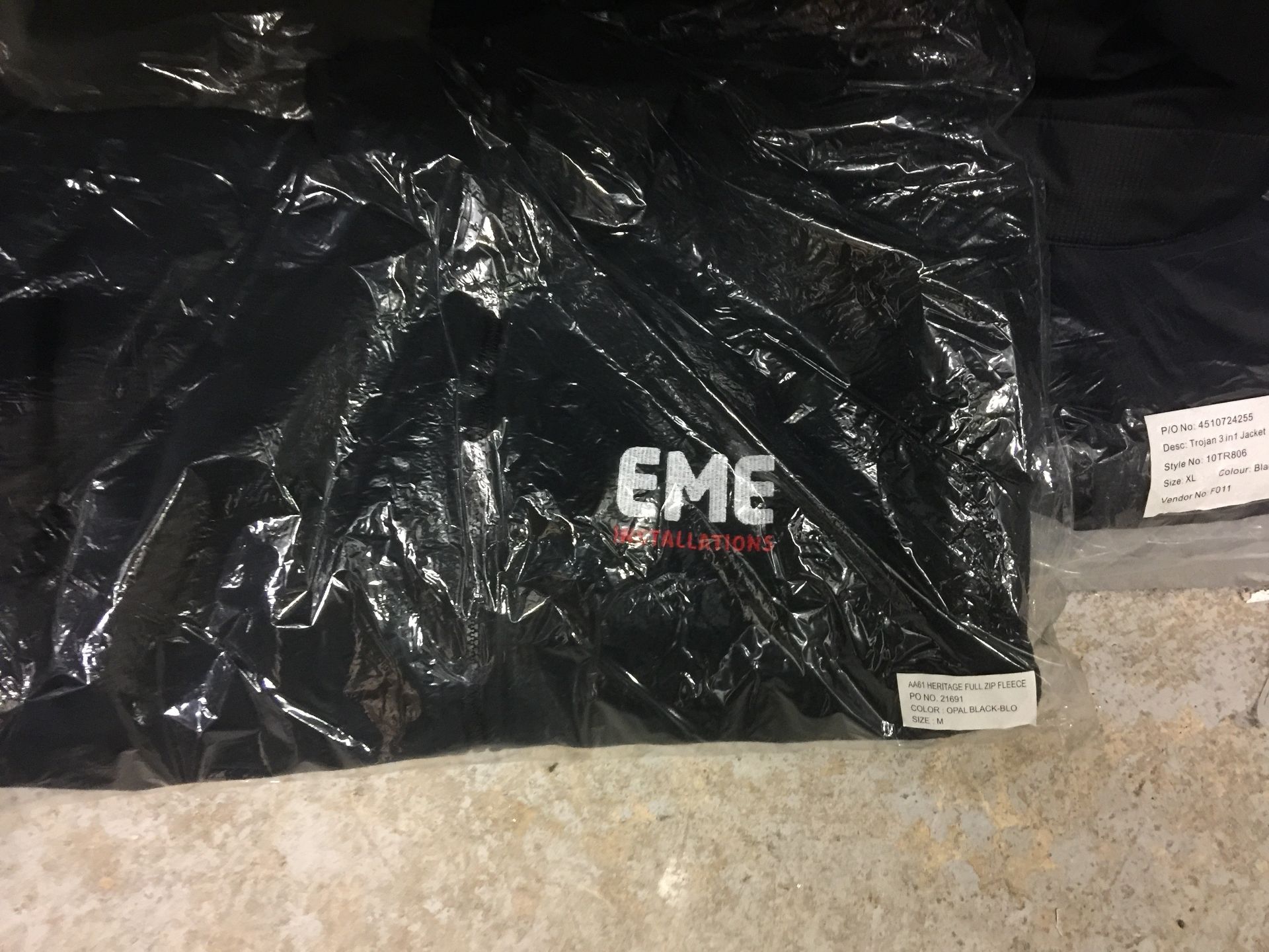 A large quantity of assorted work clothes - new t shirts, sweatshirts, hi viz vests with EME logo - Image 4 of 4