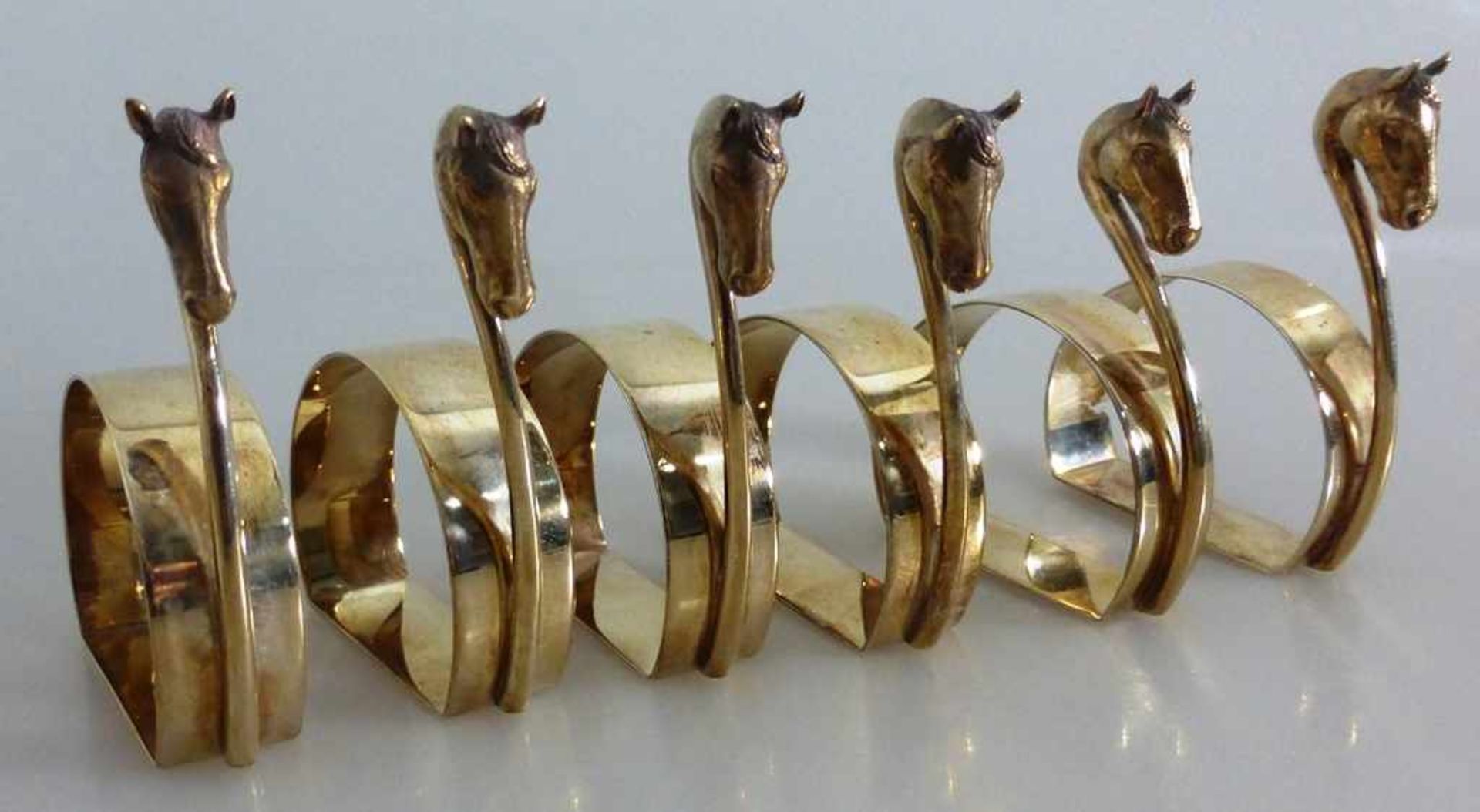 6 Serviettenringe, aussergewöhnliche Form mit Pferdekopf, England 20.Jh., Sterling Silber,