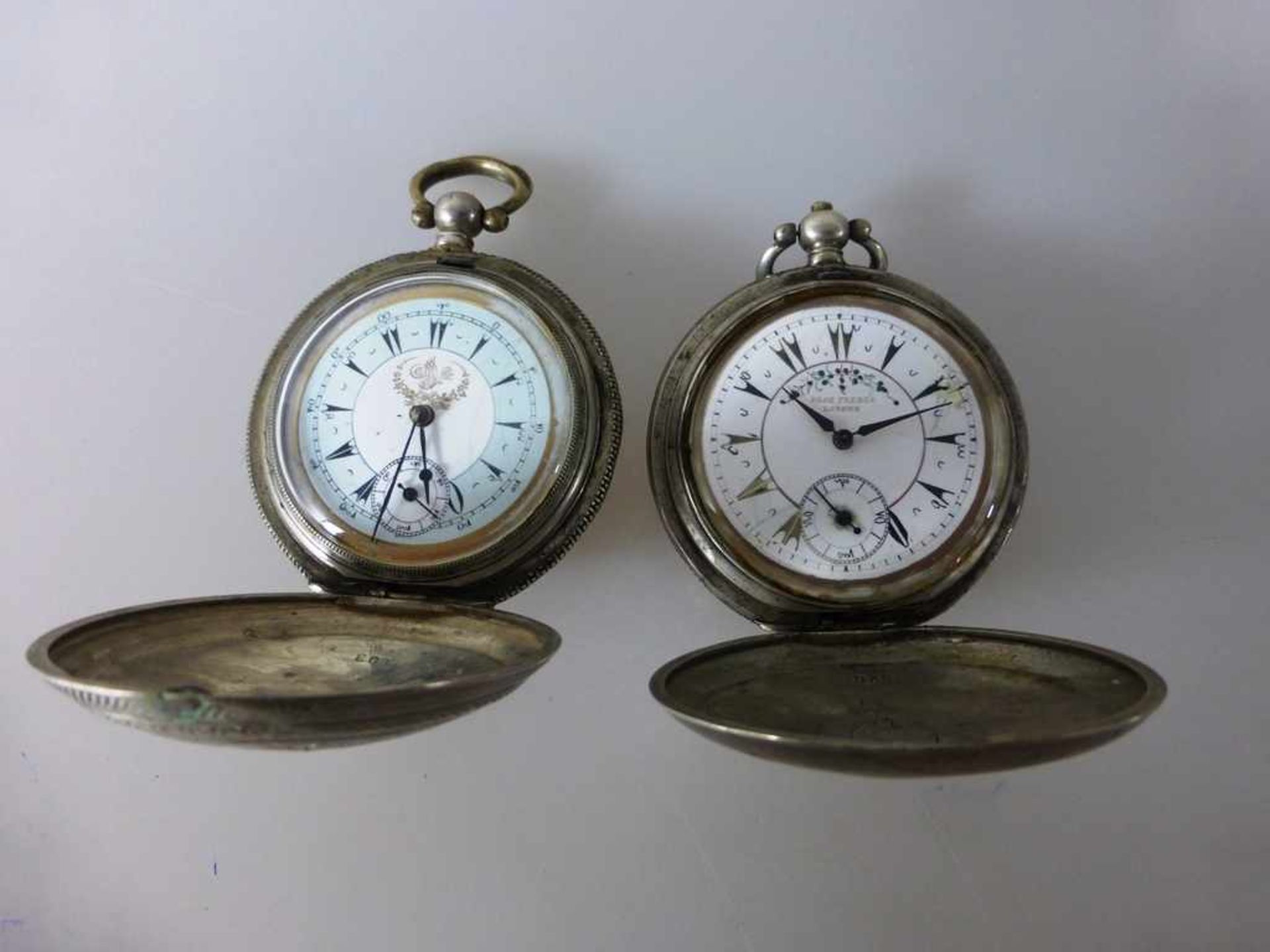 2 Schlüsseltaschenuhren für den arabischen Markt, um 1900, eine Uhr bez. London Droz.Freres, Glas