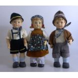 3 Bisquitporzellan Puppen im Stil der Hummelfiguren, h. je 25cm- - -18.00 % buyer's premium on the