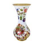 A large Baccarat white opaline enamelled glass vase, flared baluster form