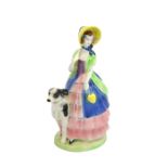 An Art Deco Goebel figure of a woman with a dog, circa 1925