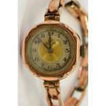 Ladies 9 carat gold wristwatch on expandable strap