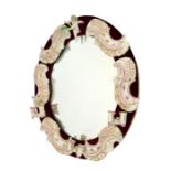 A large Continental porcelain mirror