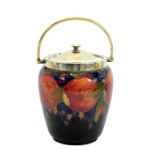 William Moorcroft, a Pomegranate on blue biscuit barrel