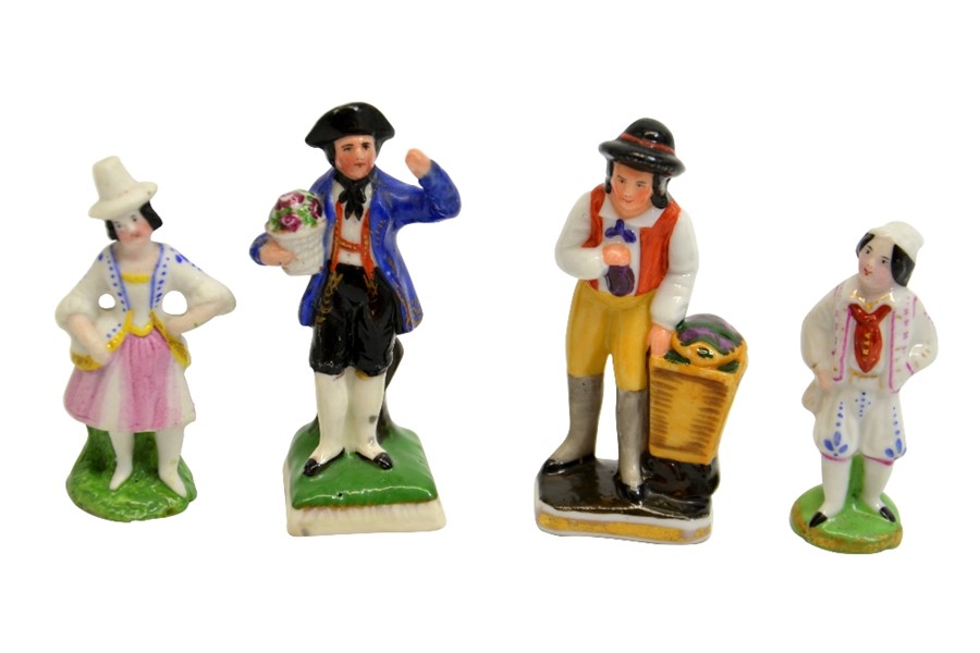 Four Sitzendorf and Thuringian miniature figure