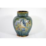 Royal Doulton, a stoneware vase, depicting a tube lined parrot amongst foliage