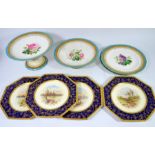 A Minton part dessert service including tazza, comport and two plates