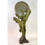 An Art Nouveau terracotta figural mirror